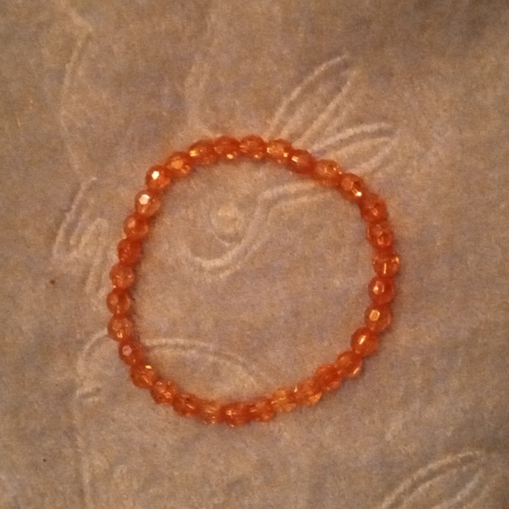 Minimalist handmade shiny and iridescent fun casual orange bracelet